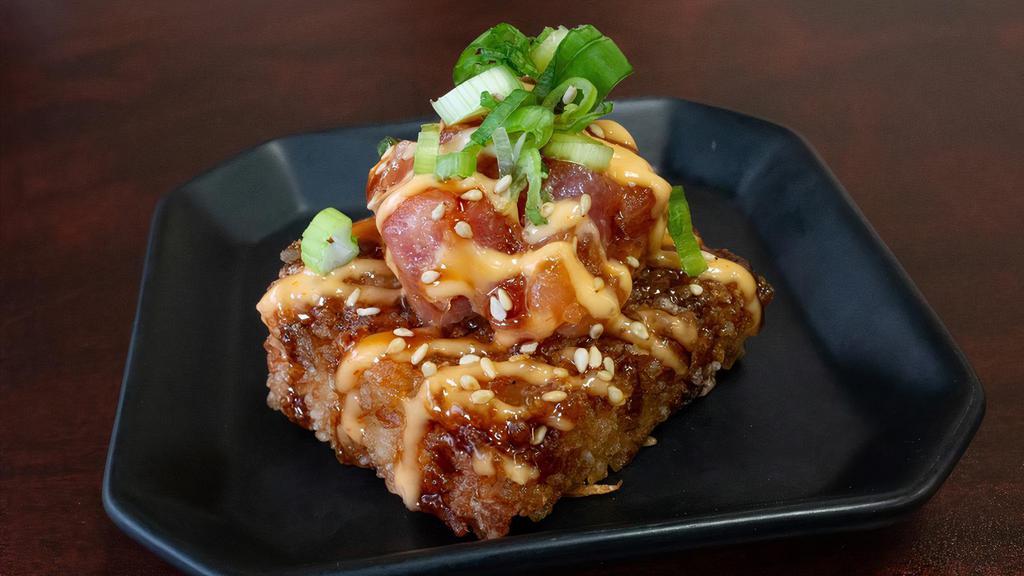 Crispy Rice · 2 pieces of crispy rice topped with your choice of
salmon or tuna drizzled in spicy mayo and
unagi sauce and green onions