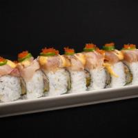 Dynamite Roll · Tempura shrimp and crab meat, topped with mixed albacore, yellowtail, tilapia, serrano peppe...