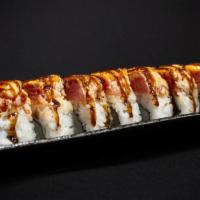 Volcano Roll · Escolar topped with seared spicy tuna and unagi sauce.