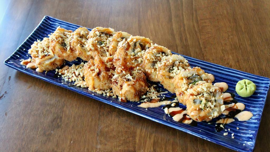 Crunchy Tempura Shrimp Roll · Deep fried roll with tempura shrimp, avocado, sushi rice, nori, fried onion, spicy Mayo and eel sauce