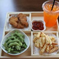 Kid'S Nugget Combo · 5 pieces of chicken nuggets, fries, fruits, and a small drink.