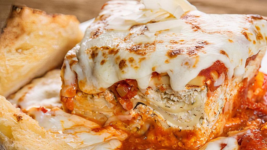 Lasagna · Homemade from the family recipe, layers of ribbon noodles and three cheeses, smothered in marinara sauce and baked mozzarella cheese. We recommend you add Italian Sausage or Meatballs to this great tasting lasagna.
