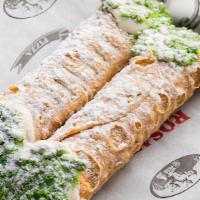 Two Cannolis · Two Cannoli Shells Filled with White Chocolate Chip Cream