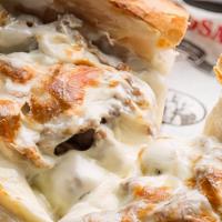 The Cheef · Our delicious Italian beef on Italian bread, with melted mozzarella cheese on top. (790 cal).