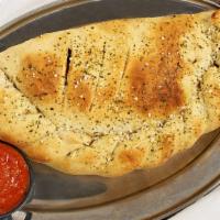 Cheese Calzone · Crisp baked Italian turnover with Rosati’s Pizza sauce & mozzarella cheese. Served with a si...