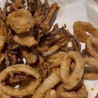 Fried Calamari · Deep-fried squid lightly breaded.