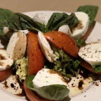 Mozzarella Caprese · Tomatoes, fresh mozzarella, olive oil, balsamic vinaigrette, and fresh basil.