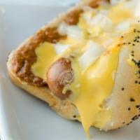 Coney Dog · A big bite of East Coast flavor! This dog is smothered in Billy’s Chili, and topped with cre...