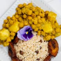 Curry Chickpeas & Potatoes · Vegan. Gluten-free. Chickpeas and potatoes steamed island-style in curry and a coconut cream...