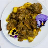 Curry Goat & Potatoes · Vegan. Gluten free.