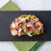 Salmon Avocado Toast · Sourdough bread topped with lightly mashed and seasoned avocado, cucumbers, radishes, pickle...