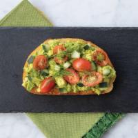 Cucumber & Dill Avocado Toast · Sourdough bread topped with lightly mashed and seasoned avocado, organic grape tomatoes, cuc...