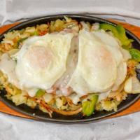 Country Skillet · Chopped chicken fried chicken, onions, green peppers, and smothered in country gravy with tw...