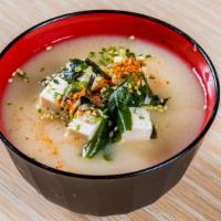 Miso Soup · Dashi base with Japanese soybean paste and your choice of tofu, wakame seaweed and green oni...