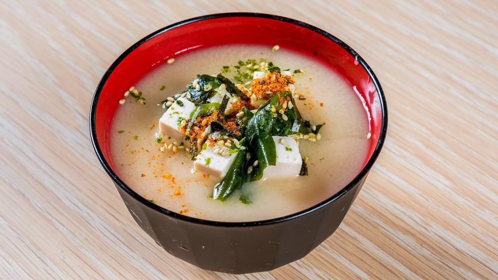 Miso Soup · Dashi base with Japanese soybean paste and your choice of tofu, wakame seaweed and green onions.