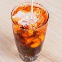 Thai Iced Tea · Sweet, creamy and rich Thai tea with condense milk in a 24 oz. compostable cup and strawless...