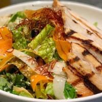 Asian Rainbow Carrot Salad · Grilled Chicken, shaved rainbow carrot, kale, romaine, miso ginger dressing, grilled lime, s...
