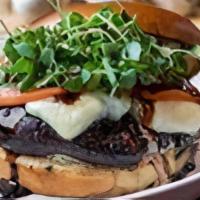 Portobello Veggie Burger · Marinated Portobello, fresh mozzarella, tomato, pesto aioli, aged balsamic, micro basil.