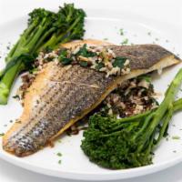 Striped Bass · Pan-seared striped bass, kale, ancient grains, broccolini, lemon, brown butter.