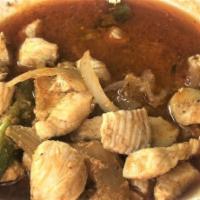 Doro Tibs / ዶሮ ጥብስ · Cubed chicken sautéed in awaze, Nitir Qibe, onions, chili pepper, and garlic.