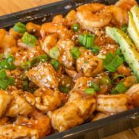 Large Hot Rice Bowl · Combo of grilled Chicken, Steak, Shrimp or Tofu over rice or greens with your choice of gril...