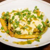 Green Chili Cheese Fries · White wine cheddar, Chef 84's Green Poison Verde, Shredded braised pork, Green Onions