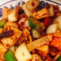 Kung Pao Tofu 宫爆豆腐 · Deep fried tofu with vegetables and peanuts.