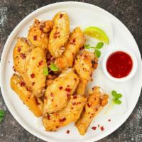 S&S Wings · Breaded or naked fresh chicken wings, fried until golden brown, and tossed in sweet and sour...
