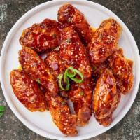 Seoul'S Wings · Breaded or naked fresh chicken wings, fried until golden brown, and tossed in korean BBQ sau...