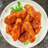 Smoking Bbq Boneless Wings · Boneless breaded fresh chicken wings, fried until golden brown, and tossed in barbecue sauce...