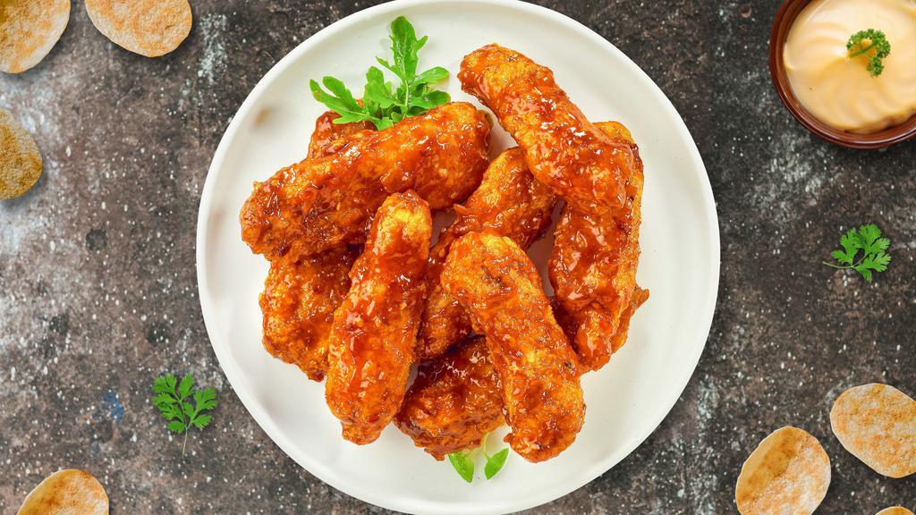 Smoking Bbq Boneless Wings · Boneless breaded fresh chicken wings, fried until golden brown, and tossed in barbecue sauce. Served with a side of ranch or bleu cheese.