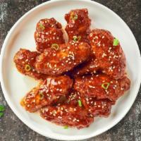 Seoul Boneless Wings · Boneless breaded fresh chicken wings, fried until golden brown, and tossed in korean BBQ sau...