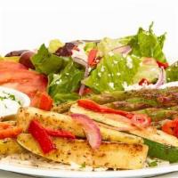 Grilled Veggie Feast · Grilled zucchini, squash, red peppers, red onions, asparagus, and tomatoes, served on a bed ...