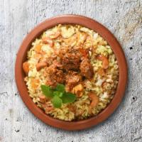 Lamb Biryani Mad · Long grain basmati rice cooked in a sealed pot with juicy pieces of lamb in a blend of exoti...