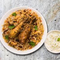 Chicken Biryani Mad · Long grain basmati rice cooked with chicken in a blend of exotic Indian spices, and herbs.