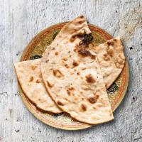 Classic Tandoori Roti · Whole wheat flat bread baked to perfection in an Indian clay oven.