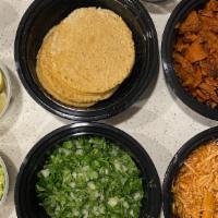 Taco Platter · 1.5 lbs of protein. Mix and match from asada, pastor, carnitas, chicken, veggie. 12- handmad...