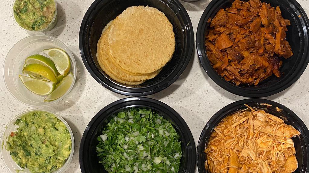 Taco Platter · 1.5 lbs of protein. Mix and match from asada, pastor, carnitas, chicken, veggie. 12- handmade corn tortillas, onion, cilantro, limes, guac, radishes, salsa Rosa, salsa verde. 
Feeds 4-6.