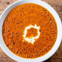 Dal Makhani · Black lentils cooked with herbs, spices and sautéed in butter.