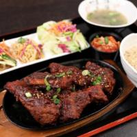Daegi Galbi Special Plate · Spicy pork ribs marinated in our Korean red pepper marinade.