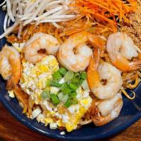 Pad Thai · Pan fried rice noodles with egg, bean sprouts and ground peanuts topped with green onions.