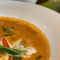 Panang Curry · Panang curry paste with coconut milk, lime leaves, basil and bell peppers. Add beef, seafood...