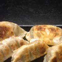 Potsticker · Deep fried crescent-shaped dumpling served with potsticker sauce