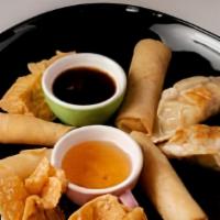 Appetizers Platter · Mixed appetizers: potsticker, fried tofu, crab delight, spring roll, prawn in a blanket