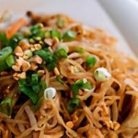 Pad Thai · Fried Thai rice noodles with egg, ground peanuts, bean sprouts, green onions, and meat or tofu
