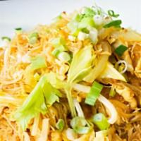 Singapore Noodles · Stir-fried thin rice noodle with yellow curry, green onion, sweet onion & celery with meat o...