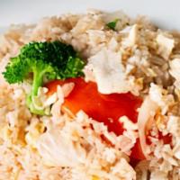 Thai Fried Rice · Fried rice with egg tomatoes, broccoli, onions, and meat or tofu