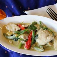 Green Curry · Meat or tofu with spicy green curry, coconut milk, basil, bell peppers, green bean, and zucc...