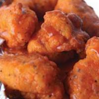 P. Dunkers · Breaded boneless chicken bites smothered in your favorite sauce, served with a side sauce of...