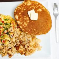 Migas Breakfast · Three scrambled eggs with onions, green chile, crispy corn tortilla strips and jalapenos pep...